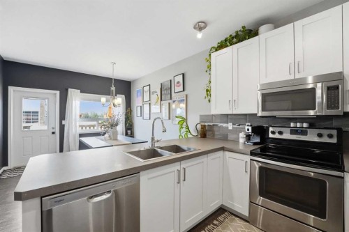 161 Crimson Court, Blackfalds, AB - Indoor Photo Showing Kitchen With Stainless Steel Kitchen With Double Sink