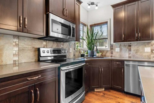 7 Rosewood Rise, Sylvan Lake, AB - Indoor Photo Showing Kitchen With Stainless Steel Kitchen With Upgraded Kitchen