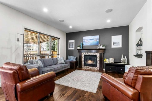 7 Rosewood Rise, Sylvan Lake, AB - Indoor Photo Showing Living Room With Fireplace