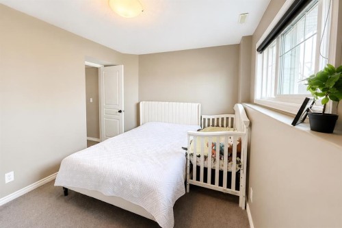 63 Hawkridge Boulevard, Penhold, AB - Indoor Photo Showing Bedroom
