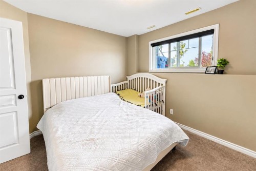 63 Hawkridge Boulevard, Penhold, AB - Indoor Photo Showing Bedroom