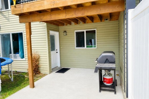 63 Hawkridge Boulevard, Penhold, AB - Outdoor With Deck Patio Veranda With Exterior