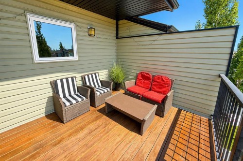 63 Hawkridge Boulevard, Penhold, AB - Outdoor With Deck Patio Veranda With Exterior
