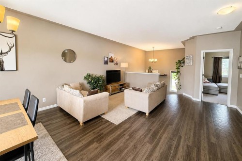 63 Hawkridge Boulevard, Penhold, AB - Indoor Photo Showing Living Room