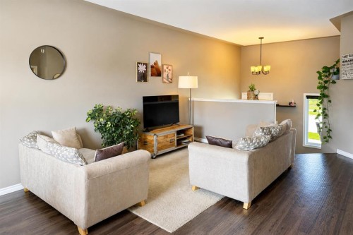 63 Hawkridge Boulevard, Penhold, AB - Indoor Photo Showing Living Room