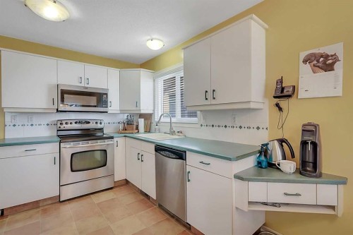 125 Crawford Street, Red Deer, AB - Indoor Photo Showing Kitchen With Stainless Steel Kitchen