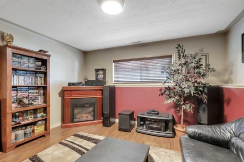 125 Crawford Street, Red Deer, AB - Indoor Photo Showing Living Room With Fireplace