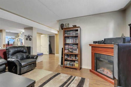 125 Crawford Street, Red Deer, AB - Indoor Photo Showing Living Room With Fireplace