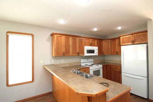 264 Vanson Close, Red Deer, AB - Indoor Photo Showing Kitchen With Double Sink