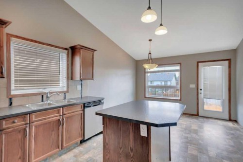 12 Kensington Close, Red Deer, AB - Indoor Photo Showing Kitchen With Double Sink