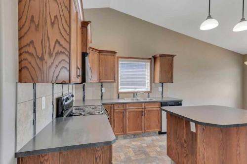 12 Kensington Close, Red Deer, AB - Indoor Photo Showing Kitchen With Double Sink