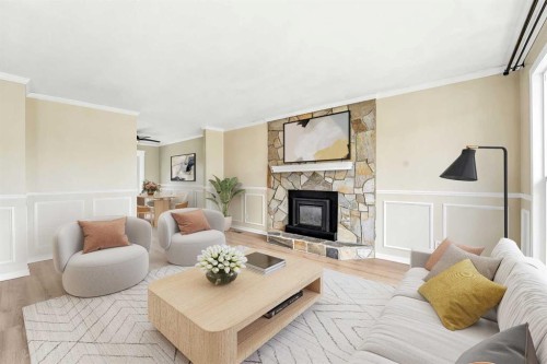 45 Northstar Drive, Lacombe, AB - Indoor Photo Showing Living Room With Fireplace