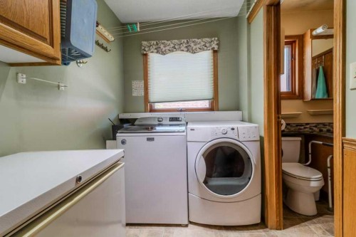 4732 48 Street, Sylvan Lake, AB - Indoor Photo Showing Laundry Room