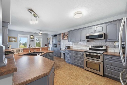 83 Irving Crescent, Red Deer, AB - Indoor Photo Showing Kitchen With Double Sink