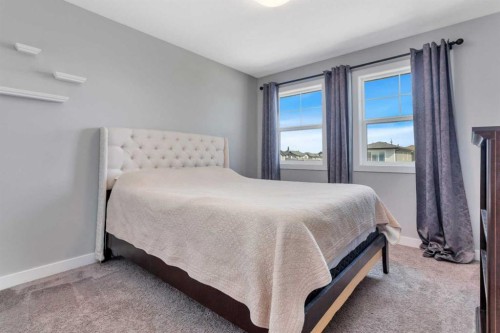 22 Bardwell Way, Sylvan Lake, AB - Indoor Photo Showing Bedroom