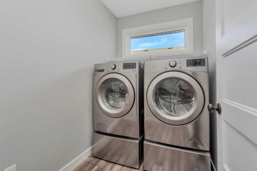 22 Bardwell Way, Sylvan Lake, AB - Indoor Photo Showing Laundry Room
