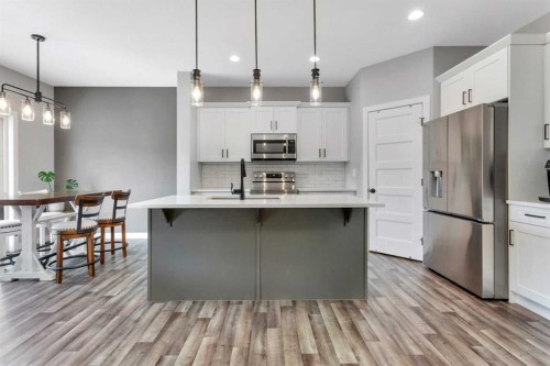22 Bardwell Way, Sylvan Lake, AB - Indoor Photo Showing Kitchen With Upgraded Kitchen