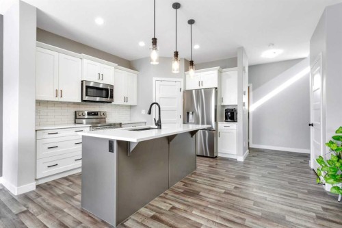 22 Bardwell Way, Sylvan Lake, AB - Indoor Photo Showing Kitchen With Upgraded Kitchen