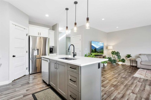 22 Bardwell Way, Sylvan Lake, AB - Indoor Photo Showing Kitchen With Double Sink With Upgraded Kitchen