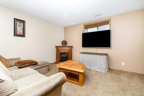 172 Duckering Close, Red Deer, AB - Indoor Photo Showing Living Room With Fireplace