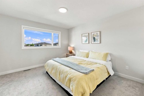41 Pinnacle Close, Blackfalds, AB - Indoor Photo Showing Bedroom