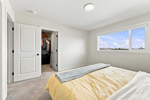 41 Pinnacle Close, Blackfalds, AB - Indoor Photo Showing Bedroom
