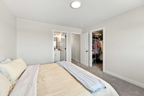 41 Pinnacle Close, Blackfalds, AB - Indoor Photo Showing Bedroom