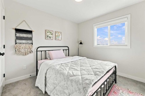 41 Pinnacle Close, Blackfalds, AB - Indoor Photo Showing Bedroom