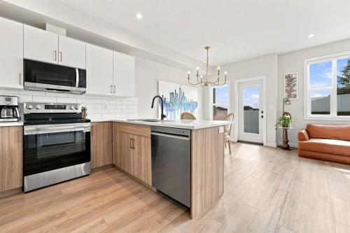41 Pinnacle Close, Blackfalds, AB - Indoor Photo Showing Kitchen With Stainless Steel Kitchen