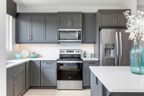 259 Chelsea Road, Chestermere, AB - Indoor Photo Showing Kitchen With Upgraded Kitchen