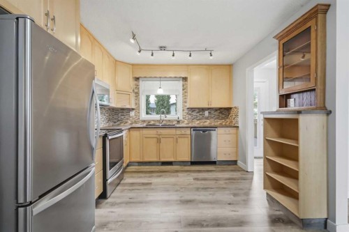 5910 57 Ave, Ponoka, AB - Indoor Photo Showing Kitchen With Stainless Steel Kitchen With Double Sink