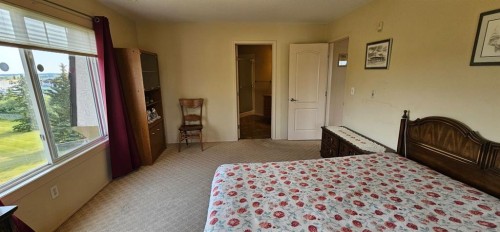 406-4425 Heritage Way, Lacombe, AB - Indoor Photo Showing Bedroom