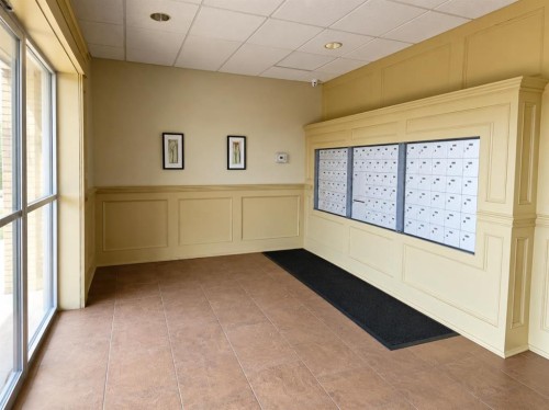 406-4425 Heritage Way, Lacombe, AB - Indoor Photo Showing Other Room