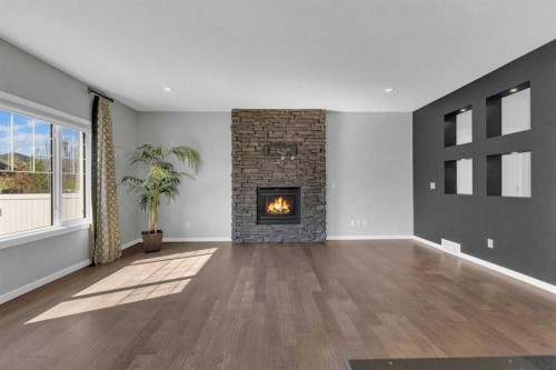 25 Lazaro Close, Red Deer, AB - Indoor Photo Showing Living Room With Fireplace
