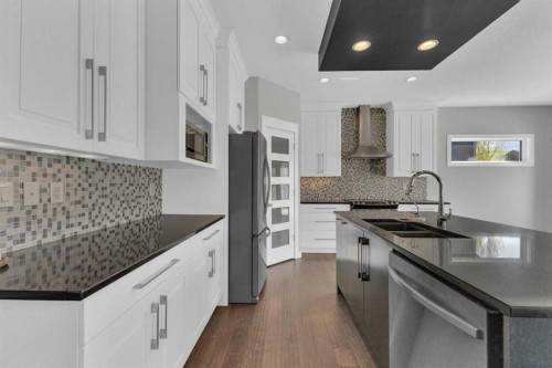 25 Lazaro Close, Red Deer, AB - Indoor Photo Showing Kitchen With Double Sink With Upgraded Kitchen