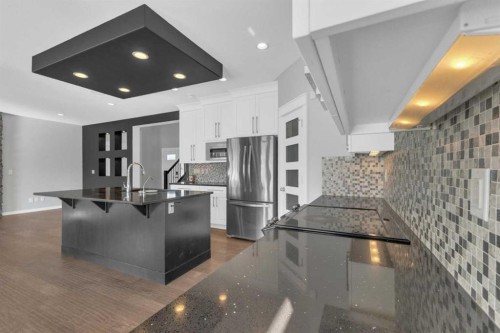 25 Lazaro Close, Red Deer, AB - Indoor Photo Showing Kitchen With Stainless Steel Kitchen With Upgraded Kitchen