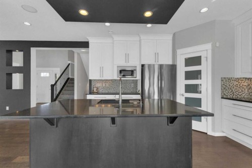 25 Lazaro Close, Red Deer, AB - Indoor Photo Showing Kitchen With Stainless Steel Kitchen With Double Sink With Upgraded Kitchen