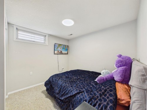 26 Otterbury Avenue, Red Deer, AB - Indoor Photo Showing Bedroom