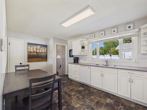 26 Otterbury Avenue, Red Deer, AB - Indoor Photo Showing Kitchen With Double Sink