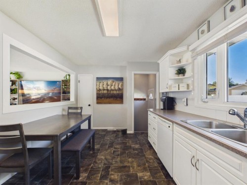 26 Otterbury Avenue, Red Deer, AB - Indoor Photo Showing Kitchen With Double Sink