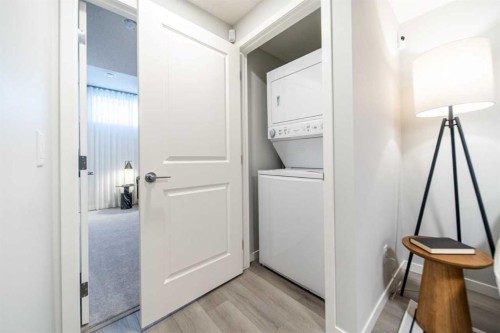 520 Tekarra Drive Nw, Calgary, AB - Indoor Photo Showing Laundry Room