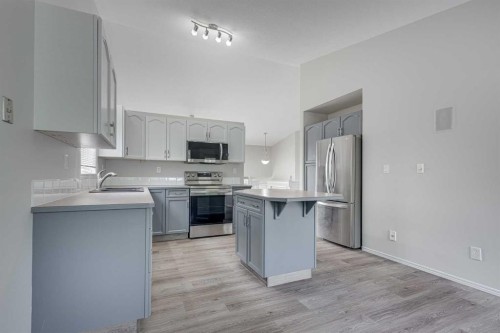 42 Westglen Boulevard, Blackfalds, AB - Indoor Photo Showing Kitchen With Upgraded Kitchen