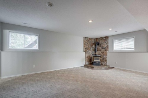 42 Westglen Boulevard, Blackfalds, AB - Indoor With Fireplace