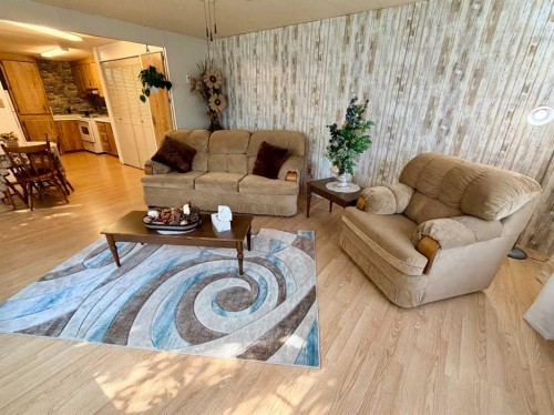 5039 51 Avenue, Caroline, AB - Indoor Photo Showing Living Room