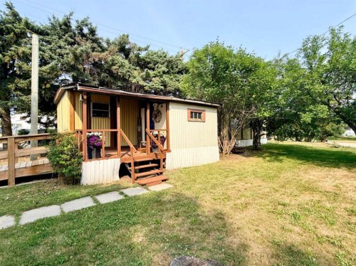 5039 51 Avenue, Caroline, AB - Outdoor With Deck Patio Veranda