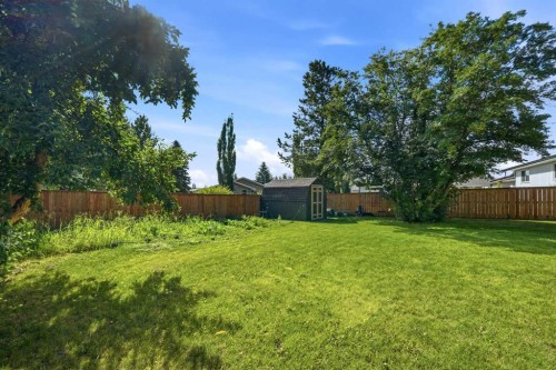 13 Spruce Drive, Lacombe, AB - Outdoor With Backyard
