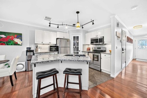 60 Arthur Close, Red Deer, AB - Indoor Photo Showing Kitchen With Upgraded Kitchen