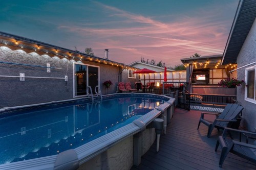 8 Caswell Close, Red Deer, AB - Outdoor With Above Ground Pool With Exterior