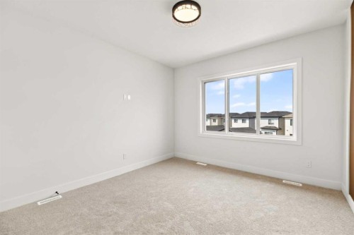 87 Linden Place, Rural Red Deer County, AB - Indoor Photo Showing Other Room