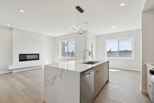 162 Drystone Way Nw, Calgary, AB - Indoor Photo Showing Kitchen With Fireplace With Upgraded Kitchen